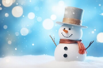 Smiling snowman in a hat and scarf on a light blue background, blurred bokeh and snow dust