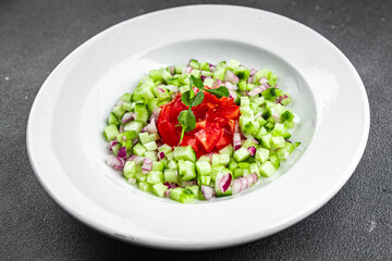 salad vegetable cucumber, tomato fresh vegetables healthy eating cooking appetizer meal food snack on the table copy space food background rustic top view