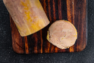 foie gras canard block ready to eat cooking appetizer meal food snack on the table copy space food background rustic top view © Alesia Berlezova