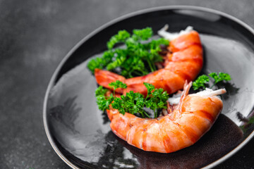 shrimp gambas langoustine large  prawn eating cooking meal food snack on the table copy space food background rustic top view 