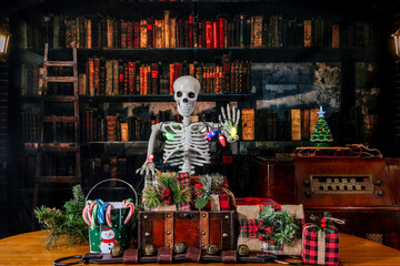 Skeleton holding Christmas lights with decorations candy canes and old library background
