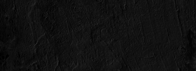 Old black concrete wall grungy texture background. Chalkboard texture concrete cement.