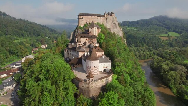 Medieval Oravsky Hrad castle at sunrise in Slovakia. Aerial view