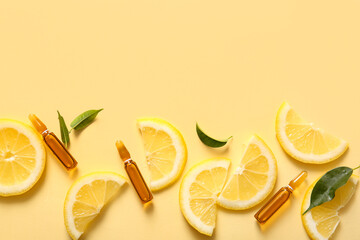 Ampoules with vitamin C and lemon slices on yellow background - obrazy, fototapety, plakaty