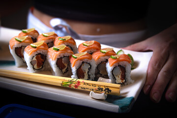 sushi with chopsticks