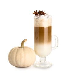 Glass cup of tasty pumpkin latte with star anise on white background