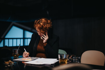 Successful businesswoman planning project for revenue growth.