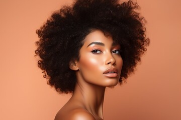 Beauty portrait of African American girl . Beautiful black woman touch her face . Facial treatment...