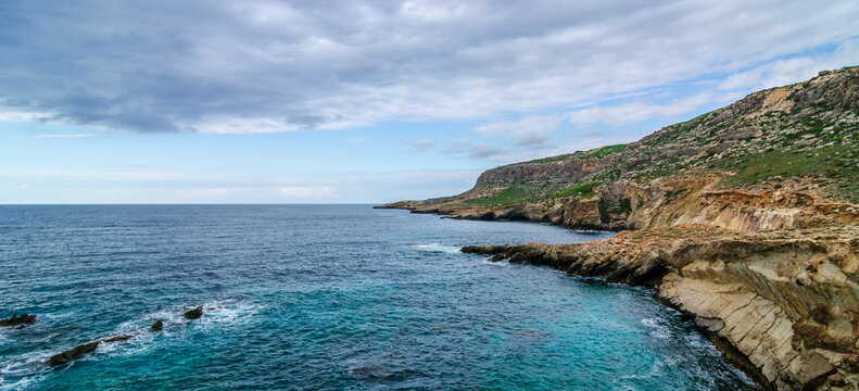 Aerial view of colorful landscape Dingli cliffs. Winter, blue sea and sky. Malta country