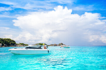 Cruise yachts and boats near the Similan Islands - most famous islands with paradise views,...