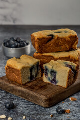 cut blueberry pudding on wood ready to eat