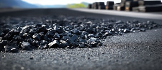 Asphalt concrete mixes mineral materials Pile of gravel crushed stone sand mineral powder and building material for the production of asphalt Territory of the asphalt concrete plant. Copy space image - obrazy, fototapety, plakaty