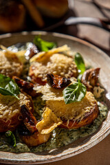 Baked pumpkin with gratin cheese