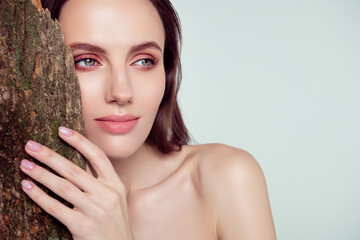 Photo of attractive gorgeous lady in spa center enjoy organic bio procedure with tree bark over...