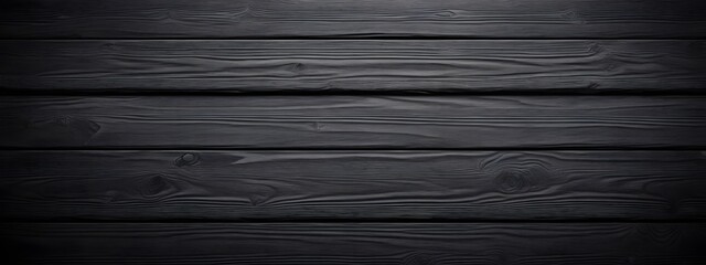 Background of an old tabletop made of horizontal boards in black. Grunge texture for background. Texture of wooden black boards.