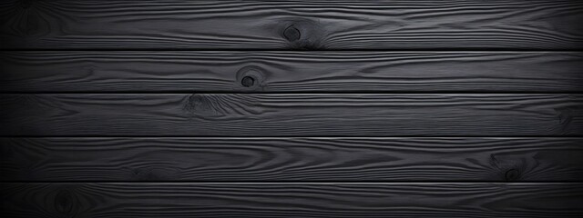 Background of an old tabletop made of horizontal boards in black. Grunge texture for background. Texture of wooden black boards.