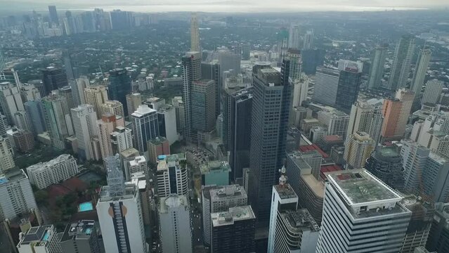 Makati City in Philippines. Cityscape Skyline Traffic and Skyscrapers in Background. Manila Business District.