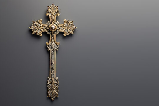 golden cross with detailed ornaments, without jesus. religious symbol, on gray background