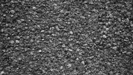 gray background, in the photo is plaster on the wall close-up.