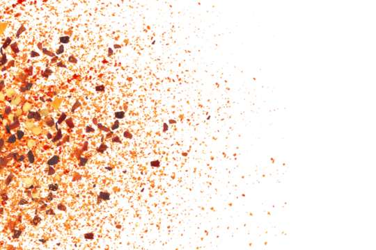 dry organic kashmiri red chili pepper flakes powder burst texture on cutout transparent background,png format,selective focus,top view,text copy space