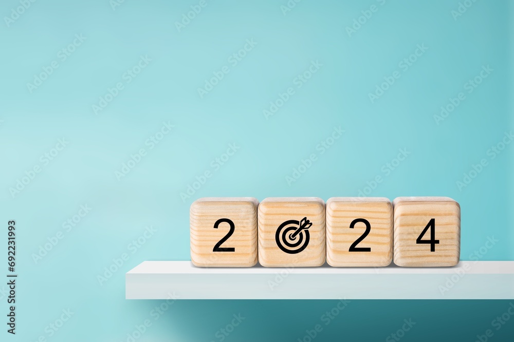 Wall mural 2024 goals concept. Wooden cubes with numbers 2024