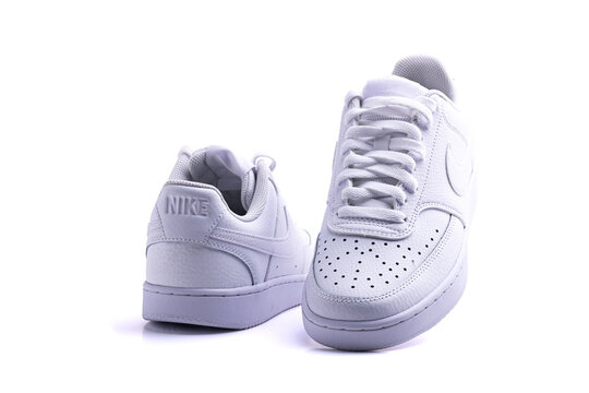 Pair of White Nike sneakers on white background, sports fashion, walking shoes, sneakers, lifestyle, product photography
