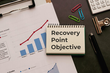 There is notebook with the word Recovery Point Objective. It is as an eye-catching image.