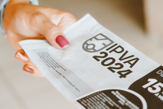December 12, 2023, Brazil. In this photo illustration the payment slip IPVA (Imposto sobre a Propriedade de Ve&iacute;culos Automotores). It is a Brazilian tax that applies to vehicle ownership.