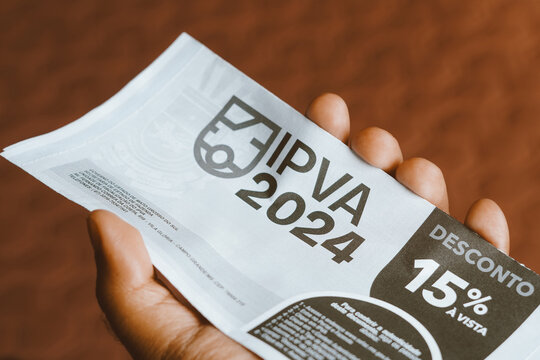 December 12, 2023, Brazil. In this photo illustration the payment slip IPVA (Imposto sobre a Propriedade de Ve&iacute;culos Automotores). It is a Brazilian tax that applies to vehicle ownership.