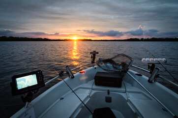 Beautiful sunset under the boat fishing session - 692239379