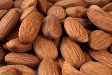 Dried almonds. Almond background. A pile of dry nuts in full frame
