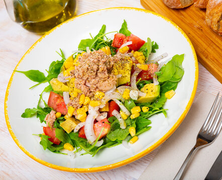 Appetizing fish salad with canned tuna. High quality photo