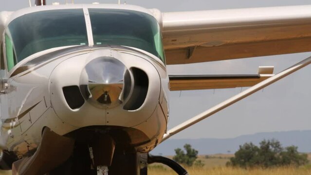 Close up on spinning propeller on small plane
