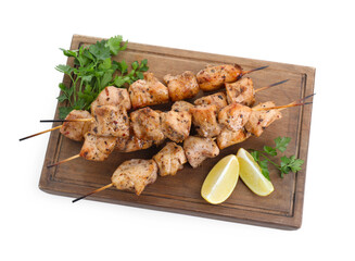 Wooden board with delicious fresh shish kebabs, parsley and lemon isolated on white, top view