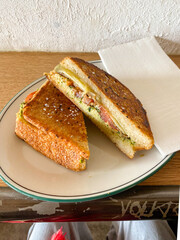 Vegetable toasted sandwich with pesto and cheese