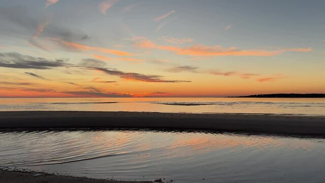 Calm Ocean Waves at Sunset on the Atlantic Ocean at Chatham, Cape Cod