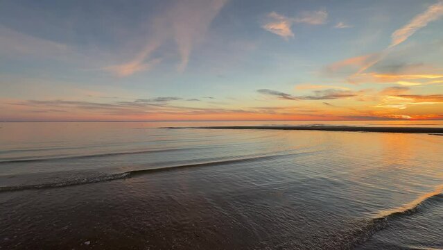 Calm Ocean Waves at Sunset on the Atlantic Ocean at Chatham, Cape Cod