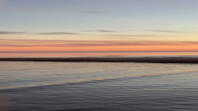 Calm Ocean Waves at Sunset on the Atlantic Ocean at Chatham, Cape Cod