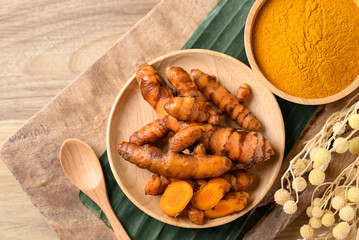 Fresh turmeric and powder, Spice in Asian cuisine, Table top view