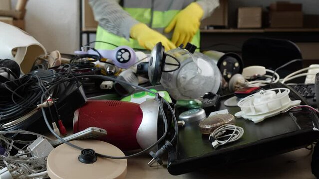 Electronic Waste Recycling Center. Used consumer electronics, broken household appliances, IT equipment, monitors, lamps, smartphones