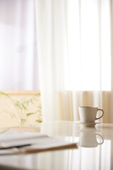 A cozy, bright room with sunlight streaming in.