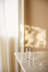 A cozy, bright room with sunlight streaming in.