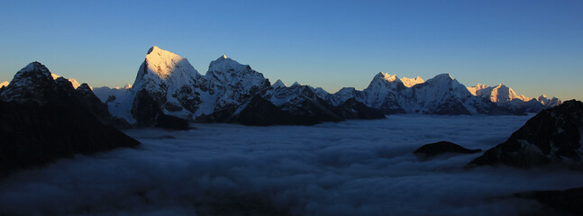 High mountains Cholatse, Kantega, Thamserku and Kusum Kanguru seen from Gokyo Ri, Nepal.