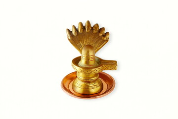 golden metal shivalinga idol for adoration to lord Shiva hindu god in white background