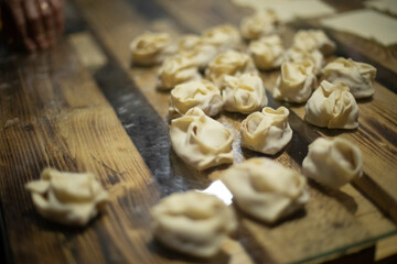 The dumpling making. Dough and minced meat. Making Dumplings.