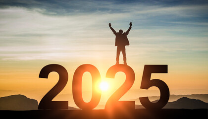 2025. New Year 2025, New Start motivation inspirational quote message on silhouette of winner man in sunset with arms up in happiness. Welcome Happy new year in 2025 - obrazy, fototapety, plakaty