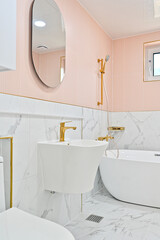 A bathroom with a lovely pink tile interior