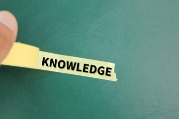 yellow sticker with the word knowledge. the concept of knowledge or skills