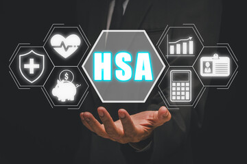 HSA, Health Savings Account concept, Businessman hand holding Health Savings Account icon on...