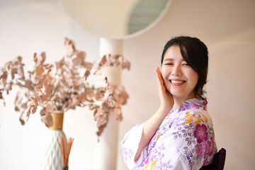 Japanese woman in yukata in coffee shop